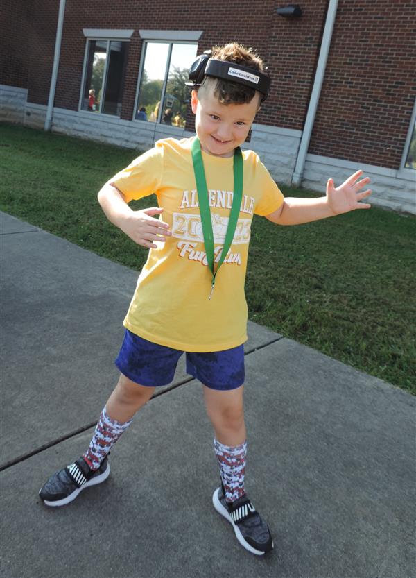 student with medal